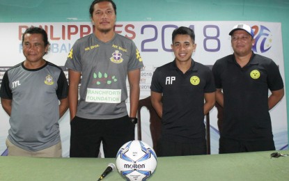 <p><strong>BEFORE THE MATCH.</strong> JPV Marikina assistant coach Frank Muescan (left) with defender Lemuel Unabia and Ceres Negros assistant coach Ian Treyes (right) with mid-fielder Arnie Pasinabo during a press conference ahead of their second consecutive match at the Panaad Stadium in Bacolod City Saturday night. (<em>Photo by Archie Rey Alipalo)</em></p>